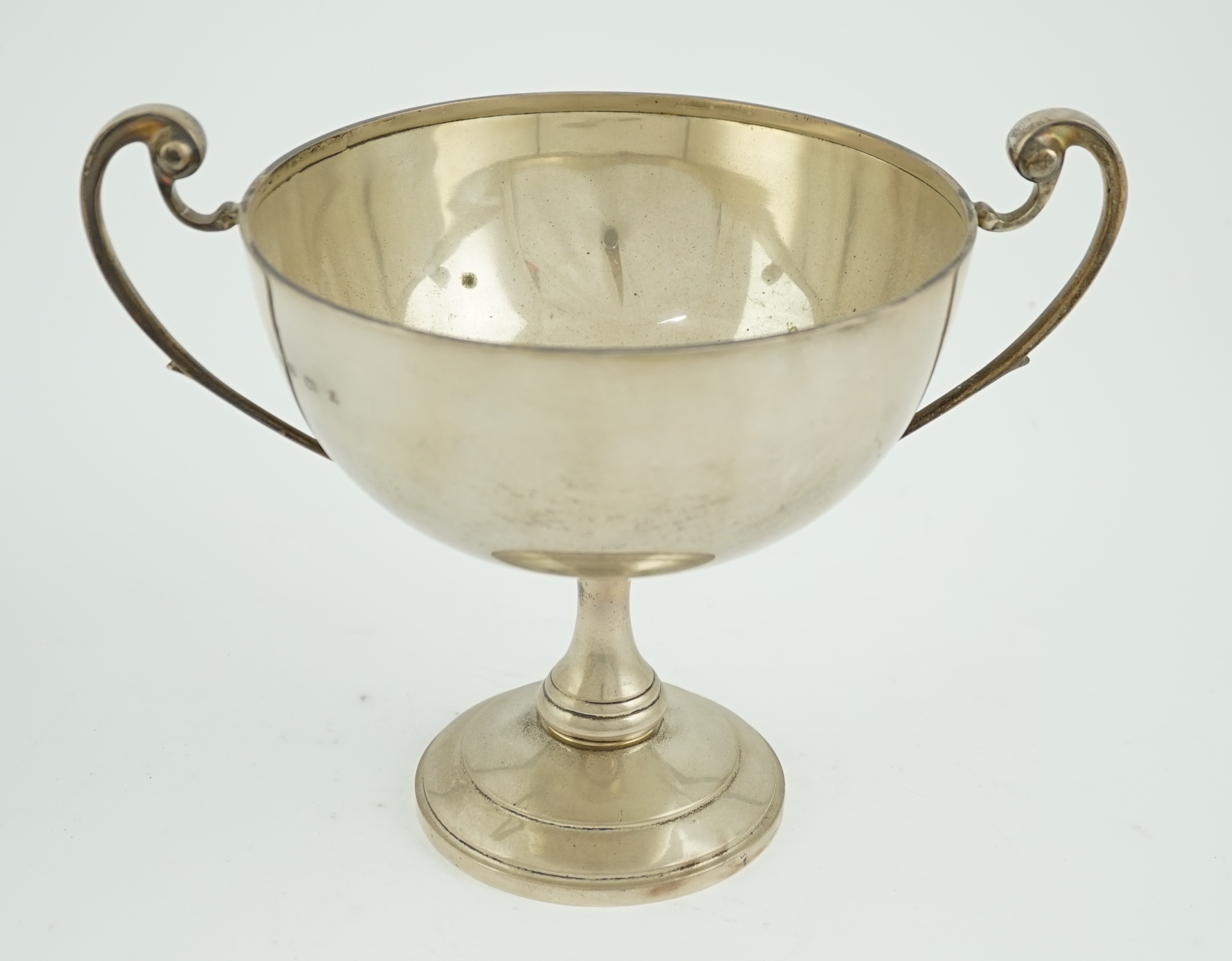 A George V silver two handled pedestal trophy cup, by Martin, Hall & Co Ltd